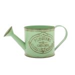 Antique metal watering can